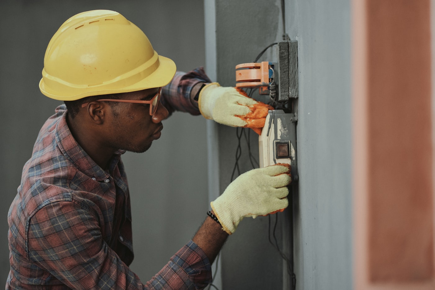 Work Orders list view with columns for title, status, priority, assignee, and due date